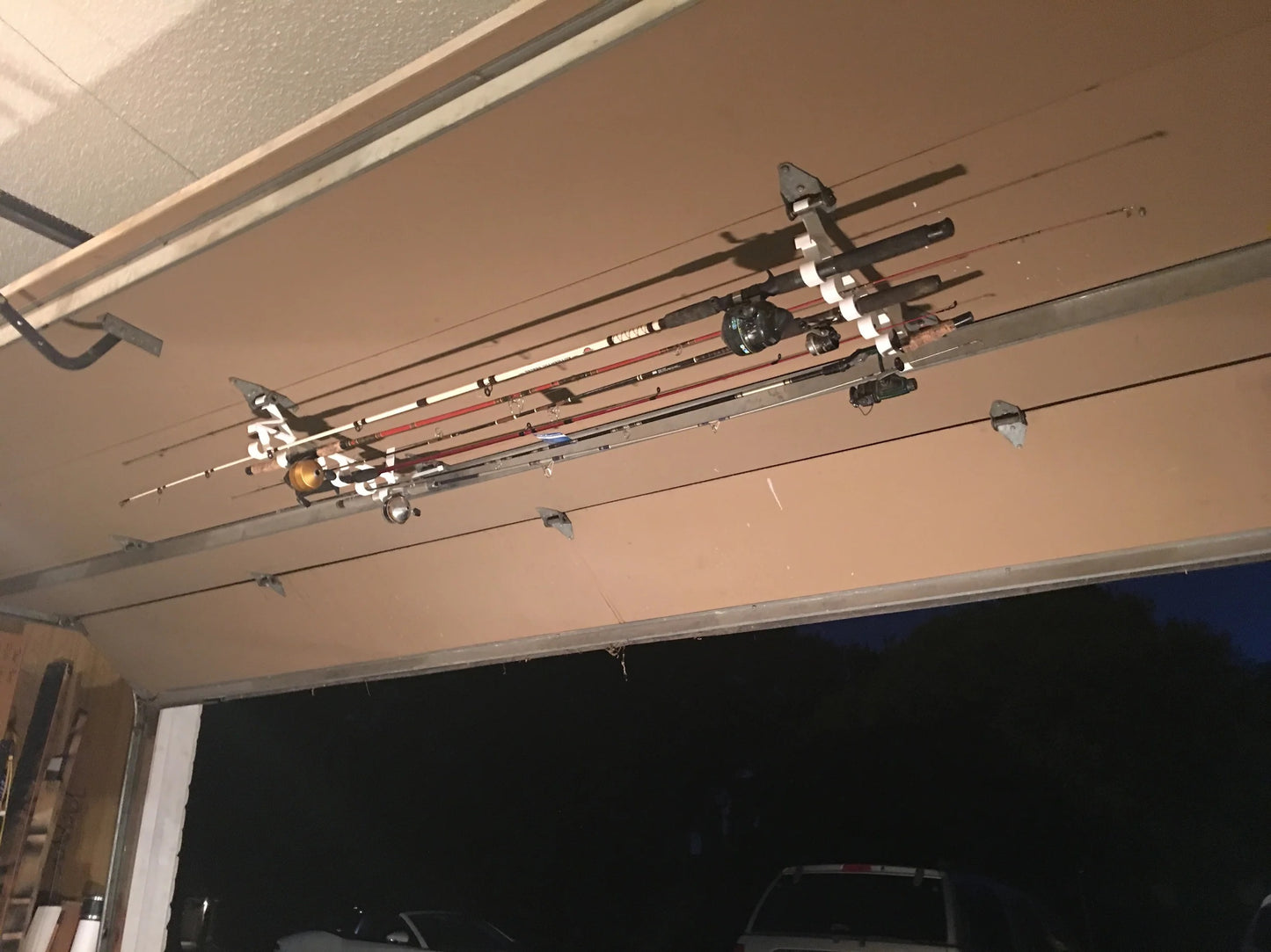 open garage door with hooks rack