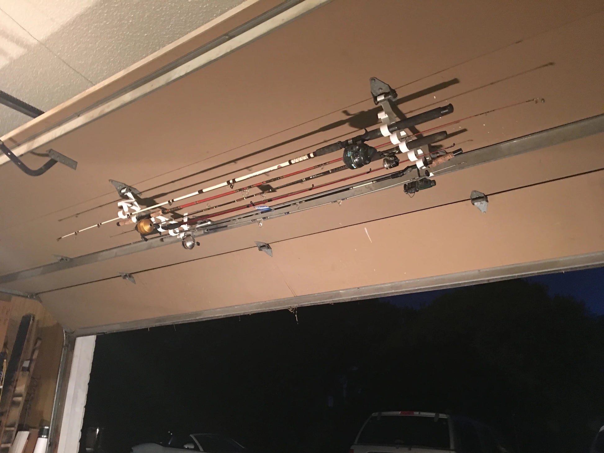 open garage door with hooks rack